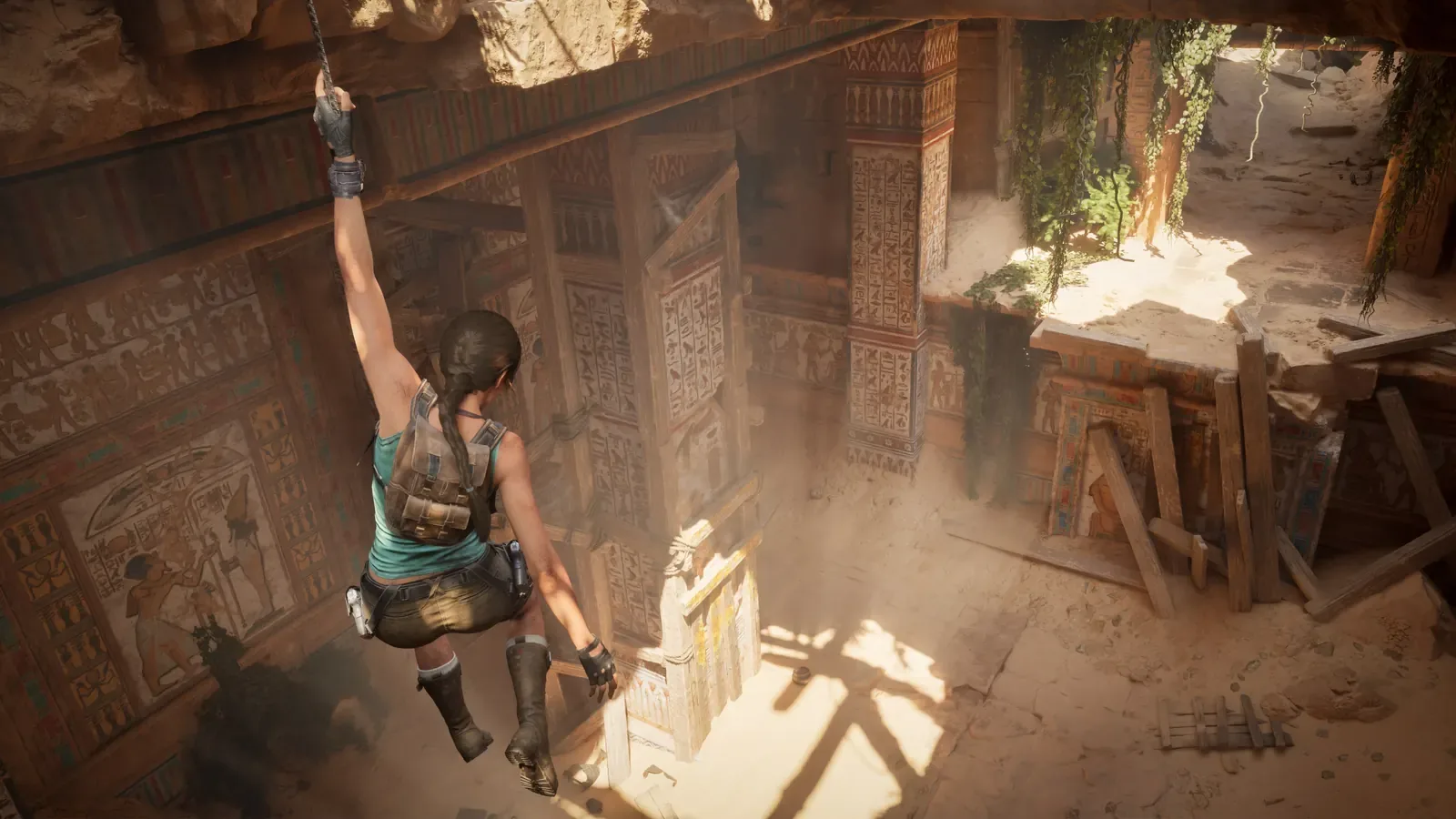 Official Legacy of Atlantis image showing Lara climbing through ancient ruins